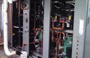 Instead of removing the heat recovery dehumidifier systems at Adlai E. Stevenson High School, the units were gutted and all new components were installed piece-by-piece into the existing shells.