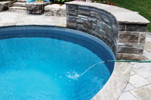 If the pool was partially drained and the fill water is not high in calcium, the level will naturally dilute as the water is topped up before opening the pool.