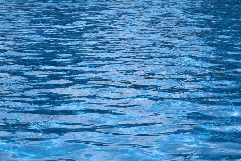 In some parts of the U.S., pools are typically treated only once as the cover prevents outside debris and waste materials from entering the water.